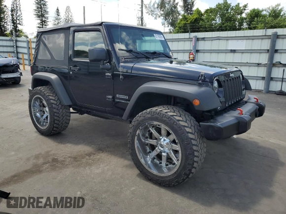 2014 Jeep Wrangler Sport with VIN 1C4AJWAG1EL200181, listed as a Copart auction lot 61165595 with 101,234 mi miles and Salvage title. Bid and sale history available at DreamBid. Image 4.