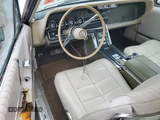 1966 Ford Thunderbird z VIN 6Y81Z127258, wystawiony jako Copart lot #52935585 z przebiegiem 59 083 mil mil oraz Czysty tytuł • Clean title. Historia ofert i sprzedaży dostępna na DreamBid. Obrazek 8.