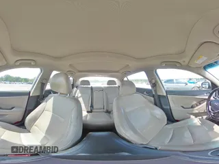 2013 Kia Optima EX z VIN 5XXGN4A78DG259164, wystawiony jako Copart lot #54259345 z przebiegiem 165 326 mil mil oraz Czysty tytuł • Clean title. Historia ofert i sprzedaży dostępna na DreamBid. Obrazek 14.