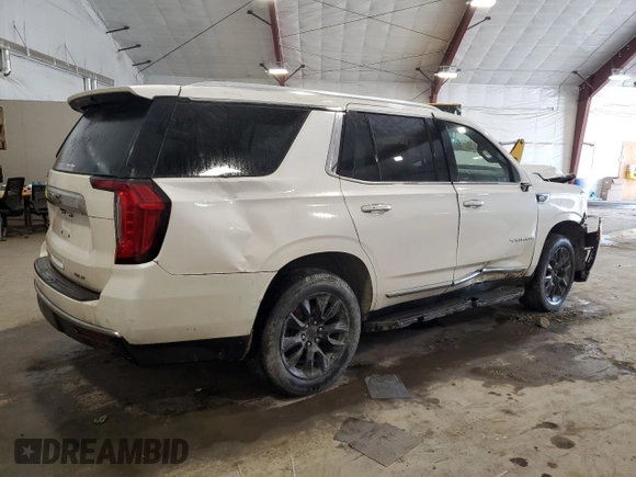 2022 GMC Yukon SLT with VIN 1GKS2BKD6NR106829, listed as a Copart auction lot 51065995 with 69,409 mi miles and Salvage Title. Bid and sale history available at carsss.com. Image 3.