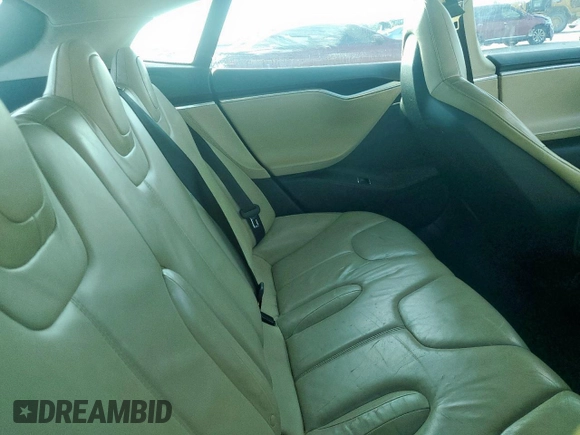 2014 Tesla Model S 60 с VIN 5YJSA1H16EFP50018, выставлен на аукционе Copart как лот 64372605 с пробегом 165 910 миль миль и Списание • Salvage title. История ставок и продаж доступна на DreamBid. Изображение 10.