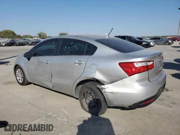 2015 Kia Rio LX with VIN KNADM4A33F6454705, listed as a Copart auction lot 76955904 with 157,078 mi miles and Salvage Title. Bid and sale history available at carsss.com. Image 2.