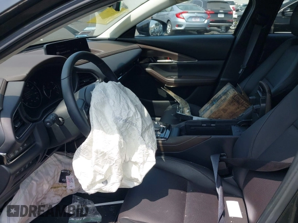 2024 Mazda CX-30 Premium Plus with VIN 3MVDMBEY1RM720111, listed as a IAAI auction lot 42730412 with 3,988 mi miles and . Bid and sale history available at DreamBid. Image 5.