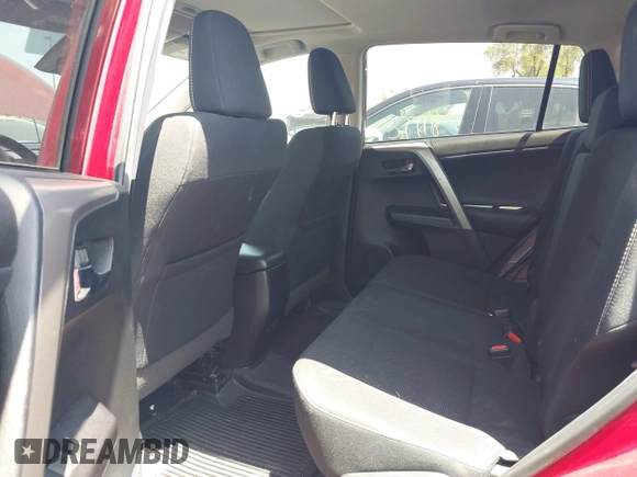 2018 Toyota RAV4 XLE with VIN 2T3WFREV4JW505053, listed as a IAAI auction lot 42552459 with 94,552 mi miles and . Bid and sale history available at DreamBid. Image 8.