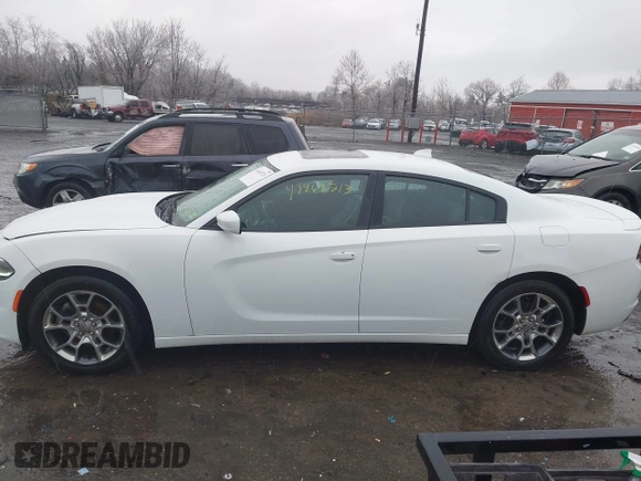 2015 Dodge Charger SXT with VIN 2C3CDXJG3FH746506, listed as a IAAI auction lot 41463713 with 130,687 mi miles. Bid and sale history available at carsss.com. Image 14.