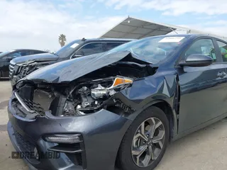 2020 Kia Forte LXS with VIN 3KPF24AD9LE165263, listed as a IAAI auction lot 41808794 with 71,217 mi miles. Bid and sale history available at carsss.com. Image 6.