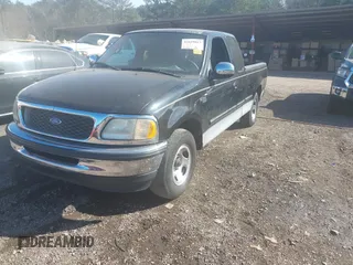 1997 Ford F-150 with VIN 1FTDX1727VKD59948, listed as a IAAI auction lot 41659013 with 257,047 mi miles and . Bid and sale history available at DreamBid. Image 2.