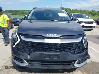 2023 Kia Sportage EX with VIN KNDPVCAG2P7046184, listed as a IAAI auction lot 42212231 with 25,212 mi miles and . Bid and sale history available at DreamBid. Image 12.
