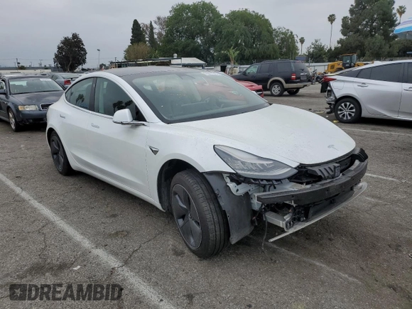 2020 Tesla Model 3 Standard Range Plus with VIN 5YJ3E1EA5LF747010, listed as a Copart auction lot 50937975 with Not Provided miles and Salvage Title. Bid and sale history available at DreamBid. Image 4.