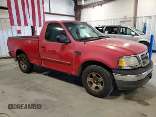 2003 Ford F-150 XL with VIN 1FTRF17W03NB26338, listed as a Copart auction lot 82484904 with 163,992 mi miles and Salvage Title. Bid and sale history available at DreamBid. Image 4.