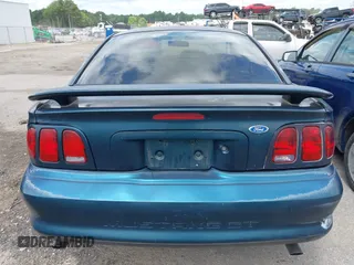 1996 Ford Mustang GT z VIN 1FALP42XXTF137304, wystawiony jako IAAI lot #42464808 z przebiegiem 166 565 mil mil oraz . Historia ofert i sprzedaży dostępna na DreamBid. Obrazek 17.