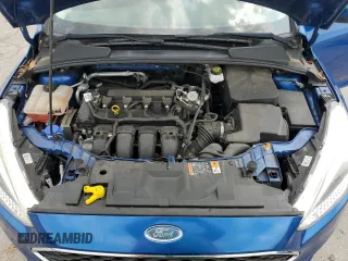 2018 Ford Focus SE with VIN 1FADP3F23JL214428, listed as a Copart auction lot 60552465 with 33,699 mi miles and Salvage title. Bid and sale history available at DreamBid. Image 7.