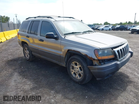 2001 Jeep Grand Cherokee Laredo with VIN 1J4GW48S11C503427, listed as a IAAI auction lot 40004360 with 232,712 mi miles and . Bid and sale history available at DreamBid. Image 1.