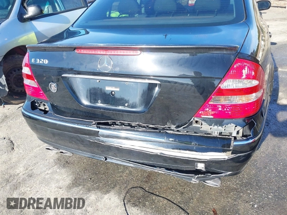 2003 Mercedes-Benz E-Class 3.2L with VIN WDBUF65J93X110625, listed as a IAAI auction lot 41485310 with 164,165 mi miles. Bid and sale history available at carsss.com. Image 6.
