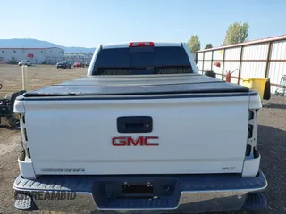 2016 GMC Sierra 1500 SLT with VIN 3GTU2NEC3GG256361, listed as a IAAI auction lot 42126412 with 137,096 mi miles and . Bid and sale history available at DreamBid. Image 17.