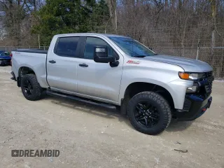 2021 Chevrolet Silverado 1500 Custom Trail Boss with VIN 3GCPYCEF8MG127960, listed as a Copart auction lot 49703345 with 30,157 mi miles and Salvage Title. Bid and sale history available at DreamBid. Image 4.