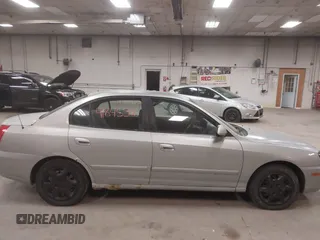 2004 Hyundai Elantra GLS z VIN KMHDN46D54U913626, wystawiony jako IAAI lot #41845546 z przebiegiem 187 267 mil mil oraz . Historia ofert i sprzedaży dostępna na DreamBid. Obrazek 14.
