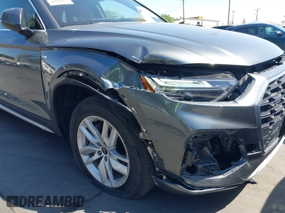 2022 Audi Q5 S line Premium z VIN WA1GAAFY3N2088773, wystawiony jako IAAI lot #41969990 z przebiegiem 22 922 mil mil oraz . Historia ofert i sprzedaży dostępna na DreamBid. Obrazek 6.