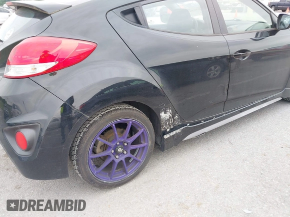 2013 Hyundai Veloster Turbo z VIN KMHTC6AE9DU097968, wystawiony jako IAAI lot #42307943 z przebiegiem 141 216 mil mil oraz . Historia ofert i sprzedaży dostępna na DreamBid. Obrazek 13.