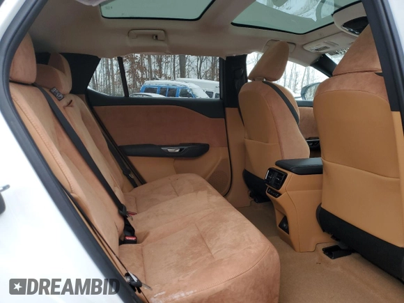 2024 Lexus RZ 450e Premium z VIN JTJAAAABXRA025712, wystawiony jako Copart lot #86183394 z przebiegiem 3 799 mil mil oraz Szkoda całkowita • Salvage title. Historia ofert i sprzedaży dostępna na DreamBid. Obrazek 12.