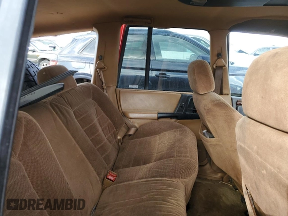 1996 Jeep Grand Cherokee Laredo with VIN 1J4GZ58Y0TC162591, listed as a Copart auction lot 43027025 with 383,318 mi miles and Salvage Title. Bid and sale history available at carsss.com. Image 10.