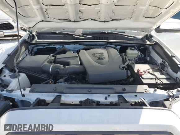 2021 Toyota Tacoma SR z VIN 3TMCZ5AN8MM387166, wystawiony jako Copart lot #49952935 z przebiegiem 63 175 mil mil oraz Szkoda całkowita • Salvage title. Historia ofert i sprzedaży dostępna na DreamBid. Obrazek 11.