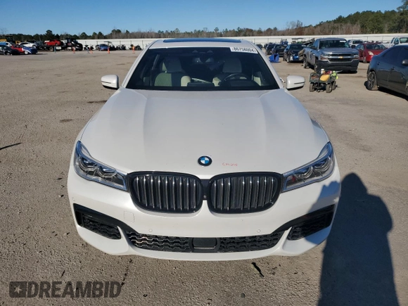 2019 BMW 7 Series 750i with VIN WBA7F0C5XKGM25897, listed as a Copart auction lot 86758004 with 68,700 mi miles and Salvage title. Bid and sale history available at DreamBid. Image 5.