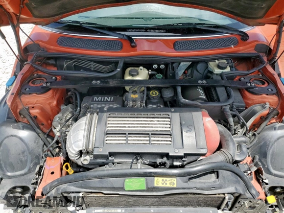 2007 MINI Convertible S with VIN WMWRH33547TJ43144, listed as a Copart auction lot 65440545 with 88,073 mi miles and Salvage title. Bid and sale history available at DreamBid. Image 11.