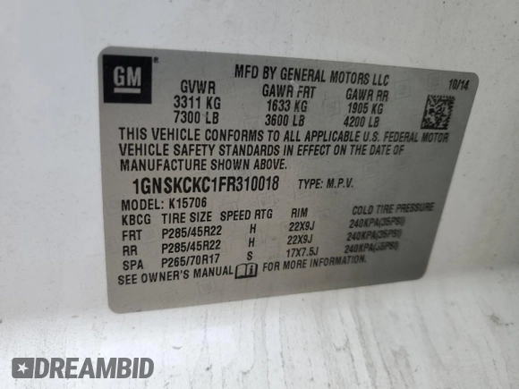 2015 Chevrolet Tahoe LTZ with VIN 1GNSKCKC1FR310018, listed as a Copart auction lot 71798454 with 244,179 mi miles and Salvage title. Bid and sale history available at DreamBid. Image 16.