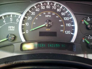 2005 Hummer H2 SUV with VIN 5GRGN23U35H111403, listed as a Copart auction lot 84720994 with 142,159 mi miles and Salvage Title. Bid and sale history available at carsss.com. Image 9.