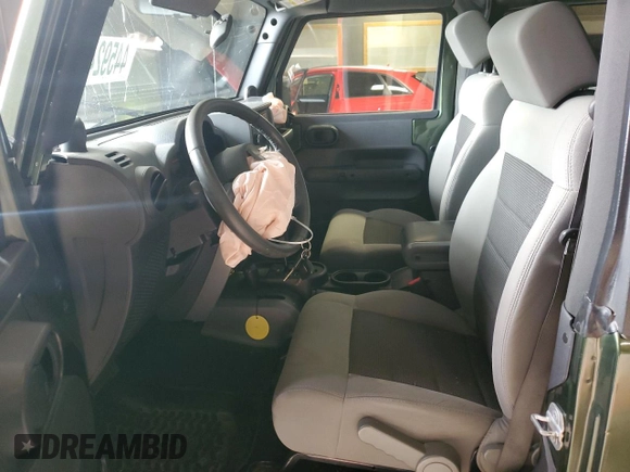 2009 Jeep Wrangler X with VIN 1J4FA24159L708224, listed as a Copart auction lot 44592475 with 82,016 mi miles and Clean Title. Bid and sale history available at DreamBid. Image 7.