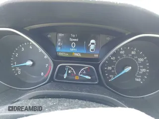 2016 Ford Focus SE with VIN 1FADP3F24GL248175, listed as a IAAI auction lot 41867019 with 135,471 mi miles. Bid and sale history available at carsss.com. Image 7.