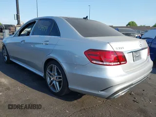 2014 Mercedes-Benz E 350 Sport with VIN WDDHF5KB0EA998283, listed as a IAAI auction lot 42743479 with 101,900 mi miles and . Bid and sale history available at DreamBid. Image 3.