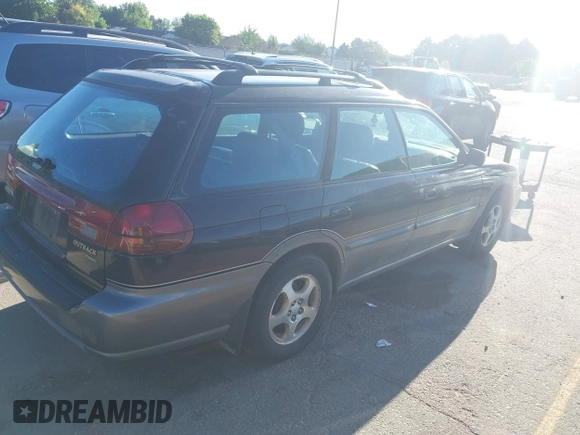 1998 Subaru Legacy Outback with VIN 4S3BG6856W7608371, listed as a IAAI auction lot 42522025 with 216,491 mi miles and . Bid and sale history available at DreamBid. Image 4.