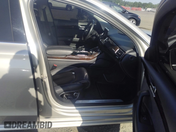2017 Audi A8 with VIN WAU44AFD3HN014802, listed as a IAAI auction lot 42573537 with 121,096 mi miles and . Bid and sale history available at DreamBid. Image 5.