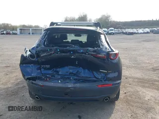2021 Mazda CX-30 Premium with VIN 3MVDMBDM4MM238367, listed as a IAAI auction lot 42124335 with 31,120 mi miles and . Bid and sale history available at DreamBid. Image 16.
