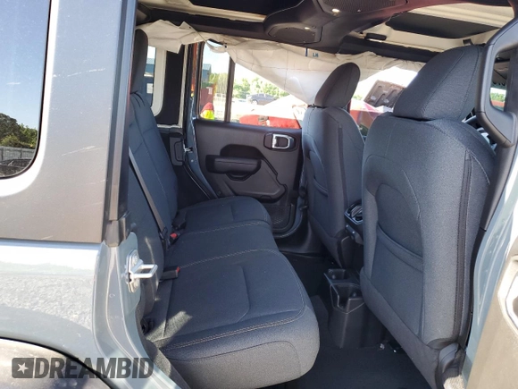 2024 Jeep Wrangler Sport S with VIN 1C4PJXDG2RW346671, listed as a Copart auction lot 57966375 with 9,430 mi miles and Salvage title. Bid and sale history available at DreamBid. Image 11.