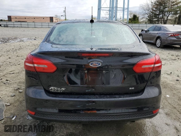 2016 Ford Focus SE с VIN 1FADP3F21GL334852, выставлен на аукционе Copart как лот 53902945 с пробегом 121 909 миль миль и Списание • Salvage title. История ставок и продаж доступна на DreamBid. Изображение 6.