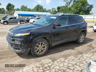 2016 Jeep Cherokee Latitude with VIN 1C4PJMCS6GW256117, listed as a Copart auction lot 59400015 with 152,279 mi miles and Salvage title. Bid and sale history available at DreamBid. Image 1.