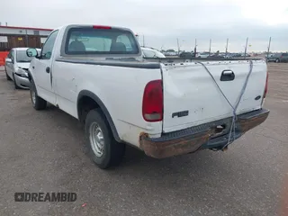 1998 Ford F-150 with VIN 1FTZF1820WKA25768, listed as a IAAI auction lot 42574710 with 206,902 mi miles and . Bid and sale history available at DreamBid. Image 6.