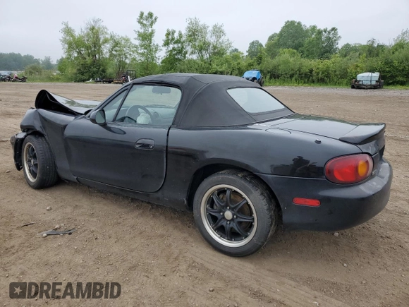 1999 Mazda MX-5 Miata with VIN JM1NB3531X0102616, listed as a Copart auction lot 59779415 with 194,494 mi miles and Salvage title. Bid and sale history available at DreamBid. Image 2.