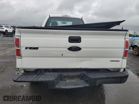 2014 Ford F-150 XL with VIN 1FTNF1EFXEKD42719, listed as a Copart auction lot 57966955 with 136,751 mi miles and Salvage title. Bid and sale history available at DreamBid. Image 6.