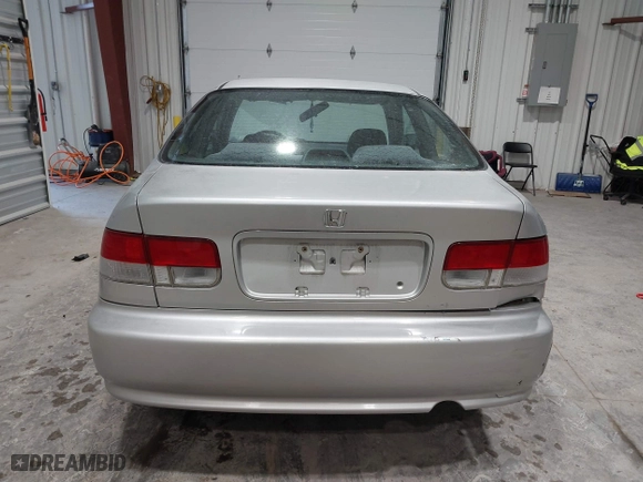 2000 Honda Civic EX with VIN 1HGEJ8142YL112989, listed as a IAAI auction lot 41469210 with 117,154 mi miles. Bid and sale history available at carsss.com. Image 16.