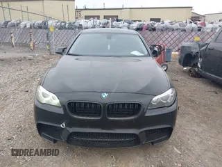 2014 BMW 5 Series 535d with VIN WBAXA5C51ED691018, listed as a IAAI auction lot 41887112 with 174,684 mi miles and . Bid and sale history available at carsss.com. Image 12.