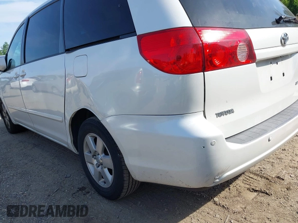 2009 Toyota Sienna XLE with VIN 5TDZK22C19S262107, listed as a IAAI auction lot 42158864 with 186,711 mi miles. Bid and sale history available at carsss.com. Image 13.