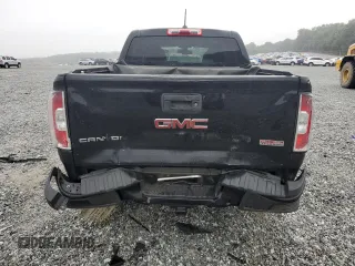 2015 GMC Canyon 4WD SLE with VIN 1GTG6BE37F1157166, listed as a Copart auction lot 71279914 with 114,484 mi miles and Salvage Title. Bid and sale history available at carsss.com. Image 6.
