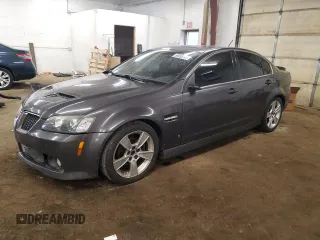 2009 Pontiac G8 z VIN 6G2ER57739L205634, wystawiony jako Copart lot #58935145 z przebiegiem 181 490 mil mil oraz Czysty tytuł • Clean title. Historia ofert i sprzedaży dostępna na DreamBid. Obrazek 1.