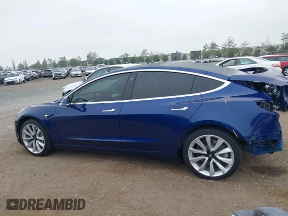 2020 Tesla Model 3 Standard Range Plus with VIN 5YJ3E1EA1LF802648, listed as a IAAI auction lot 42208034 with 27,231 mi miles and . Bid and sale history available at DreamBid. Image 14.