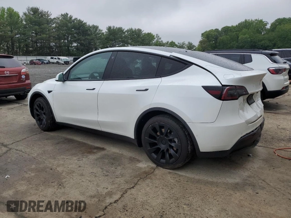 2022 Tesla Model Y Long Range z VIN 7SAYGDEE5NA016276, wystawiony jako Copart lot #55942355 z przebiegiem 14 085 mil mil oraz Szkody całkowita. Historia ofert i sprzedaży dostępna na DreamBid. Obrazek 2.