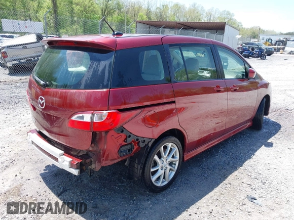 2012 Mazda 5 Grand Touring with VIN JM1CW2DL1C0123418, listed as a IAAI auction lot 42126956 with 112,411 mi miles and . Bid and sale history available at DreamBid. Image 4.